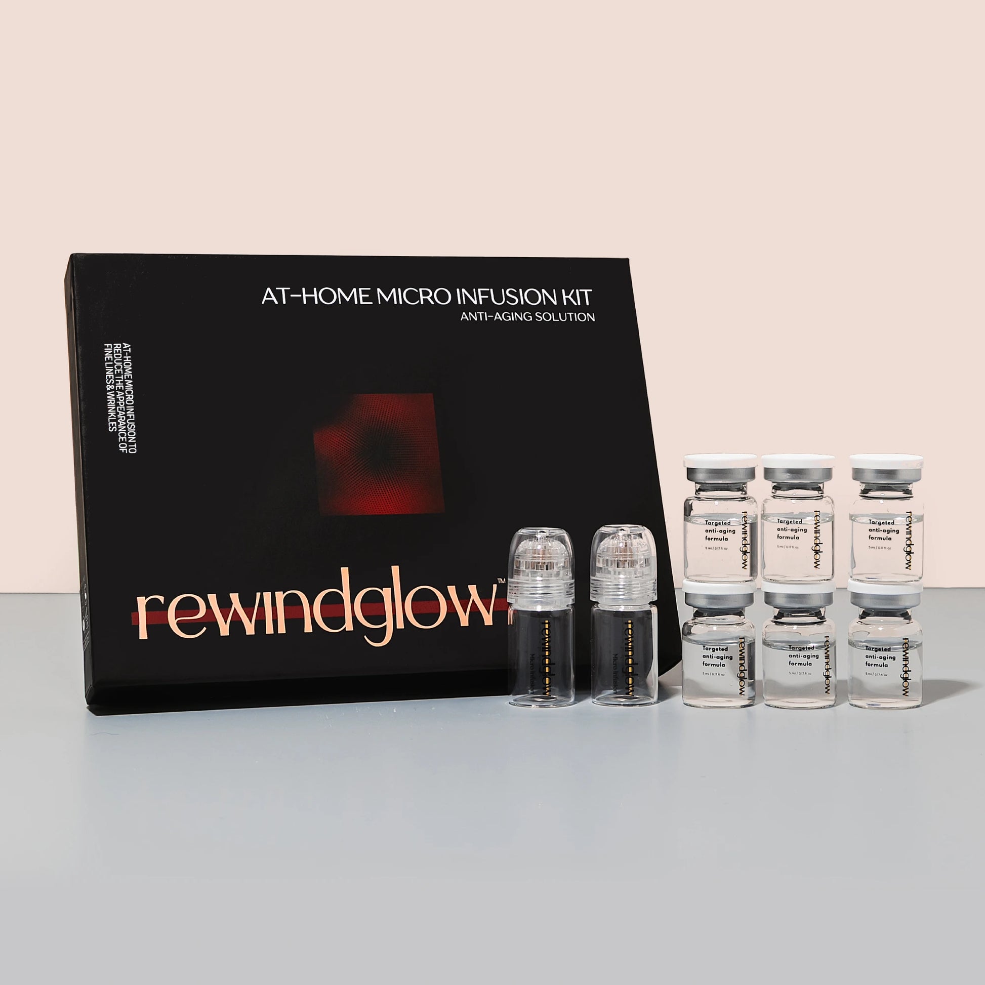 Rewindglow at-home micro infusion kit with vials on a light gray background